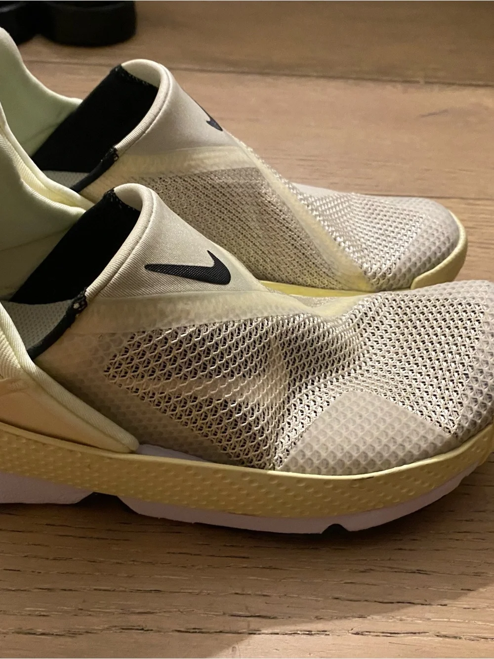 Nike Slip-On Sneakers in Pale Yellow, White and Black